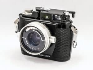 Nikon Nikonos II (Unterwasserkamera) •